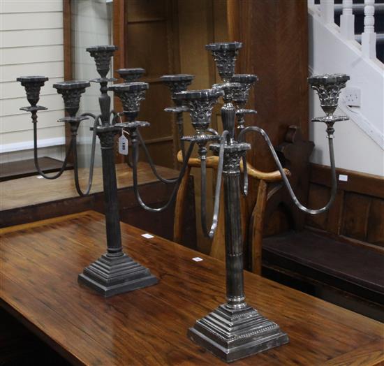 A pair of plated five light four branch candelabra, height 69cm